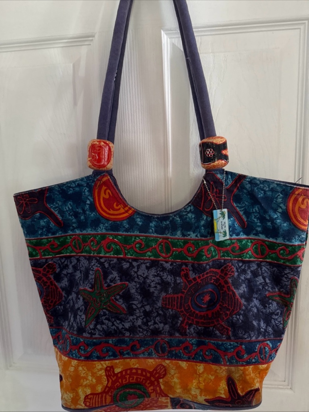 Sun & sand colorful beach in tote bag